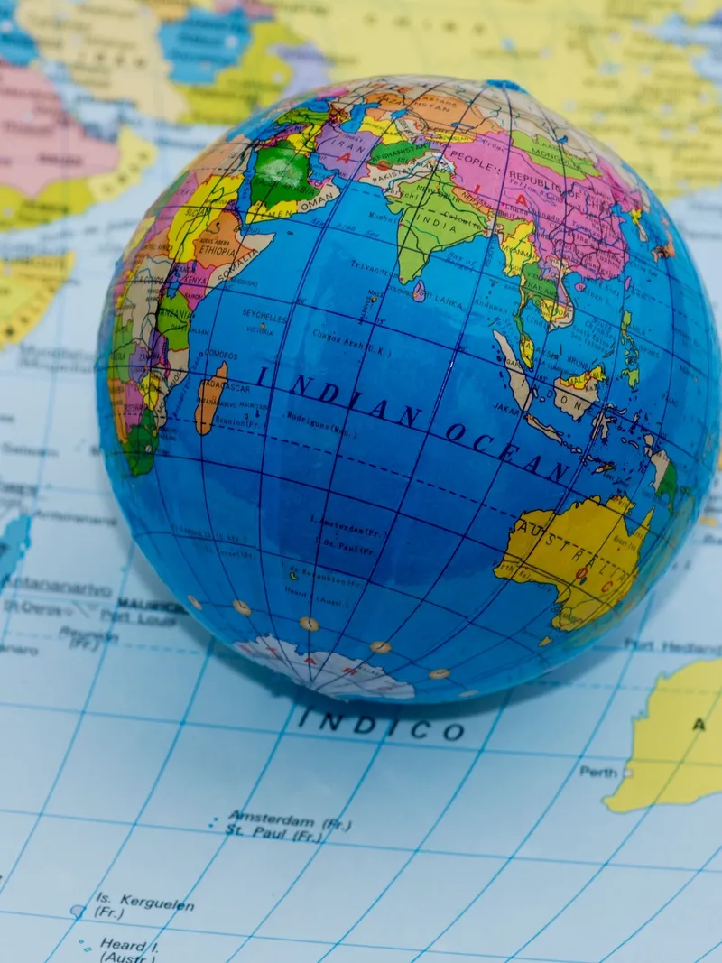 Global immigration services - world map and globe